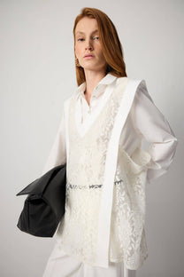 Maglia stratificata in pizzo con scollo a V
