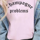 T-shirt oversize grafica “Champagne Problems”