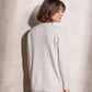 Completo in maglia scintillante due pezzi con gonna midi