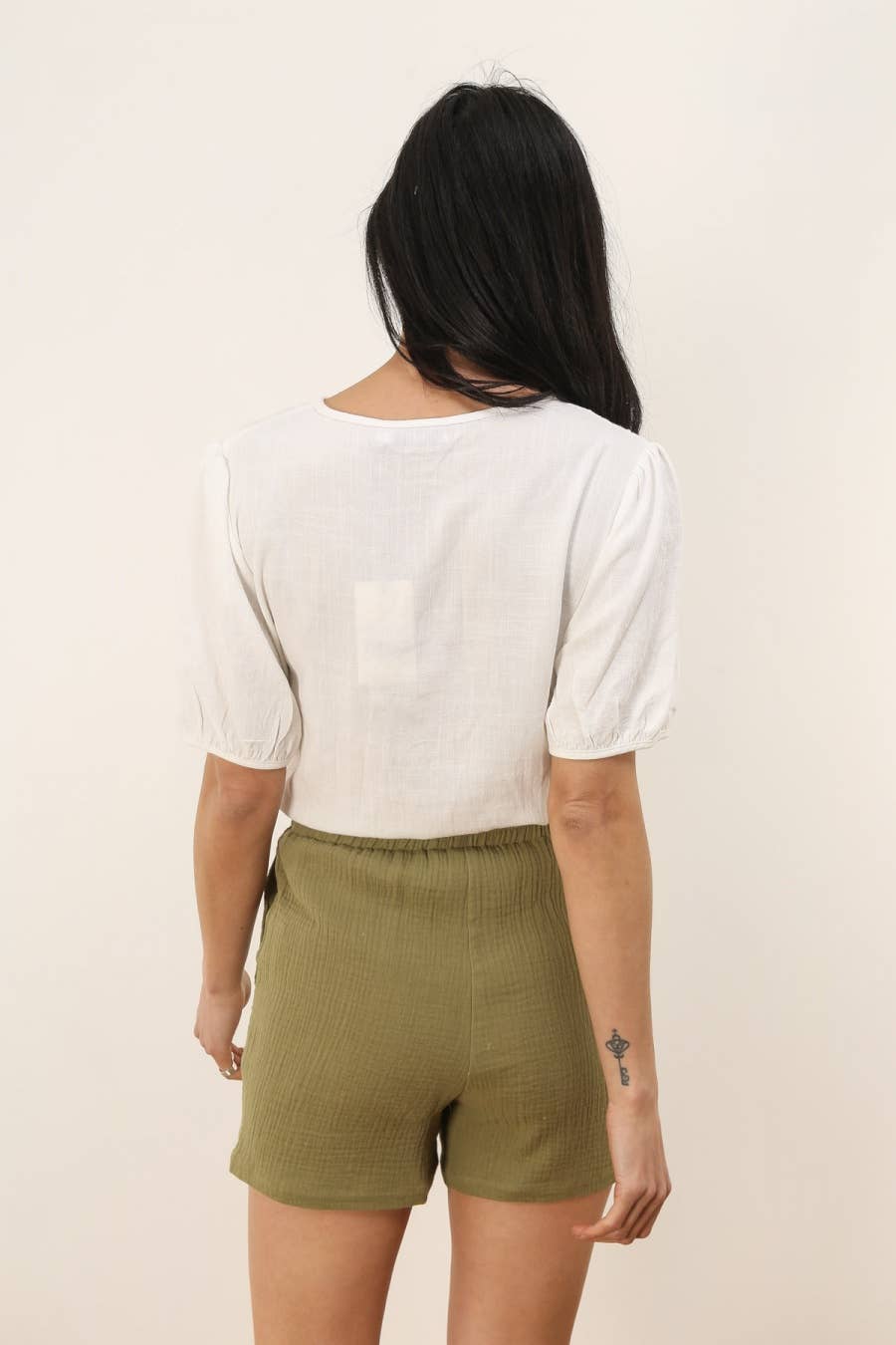 Blusa Tal con bottoni e maniche a sbuffo