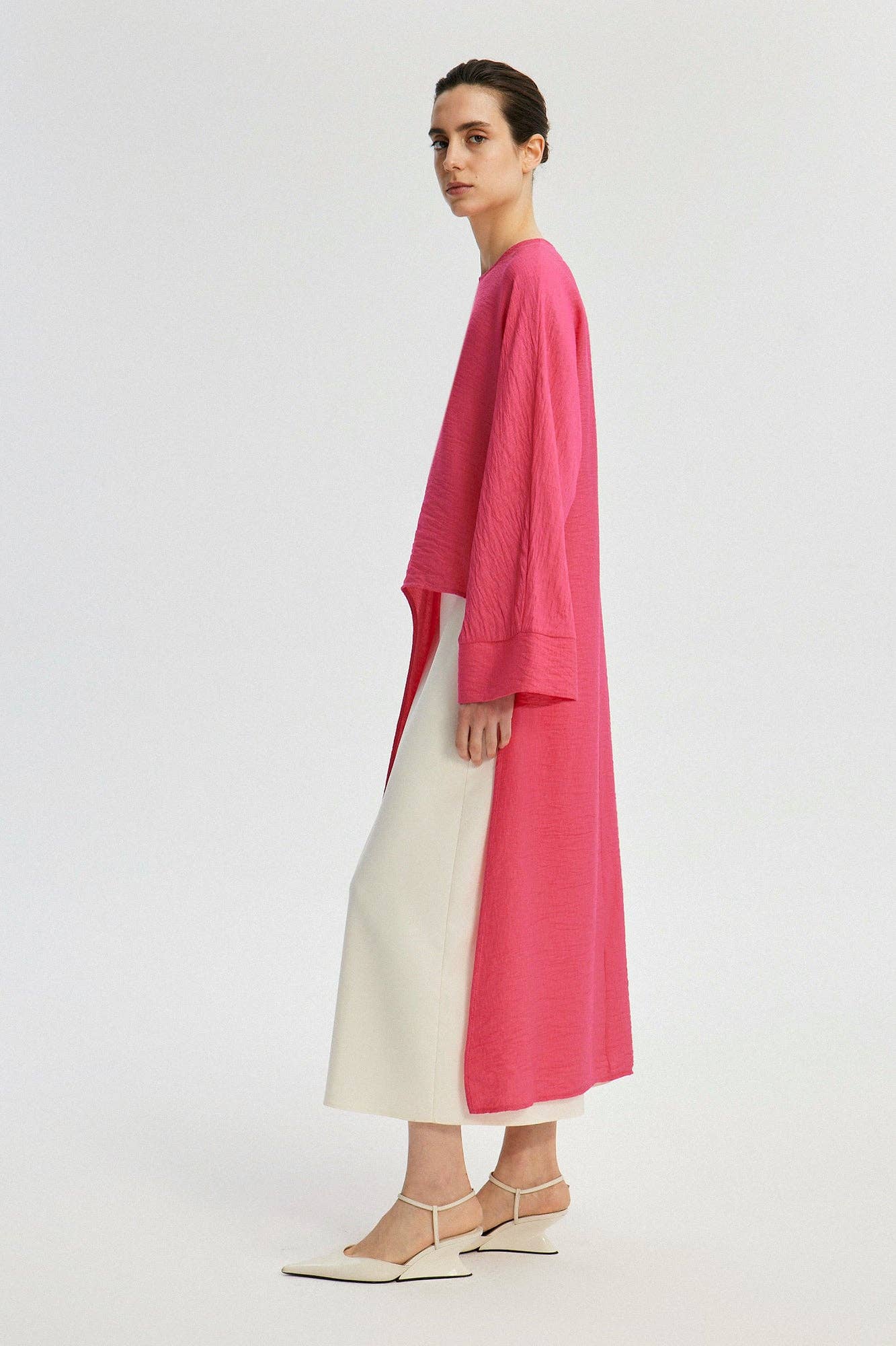 Tunica lunga con spacco frontale fucsia