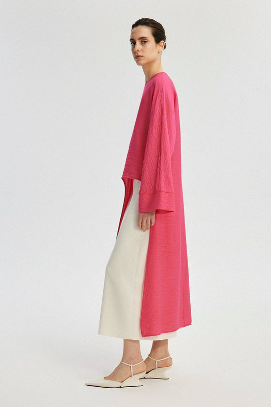 Tunica lunga con spacco frontale fucsia