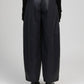 Pantaloni in similpelle blu marino a gamba ampia
