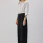 Pantaloni neri con cuciture a contrasto