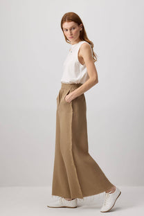 Pantaloni palazzo in cotone con bordi sfrangiati