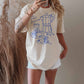 T-shirt oversize grafica “Le Petit Déjeuner” in cotone