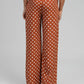 Pantaloni flare a pois caramello a vita alta