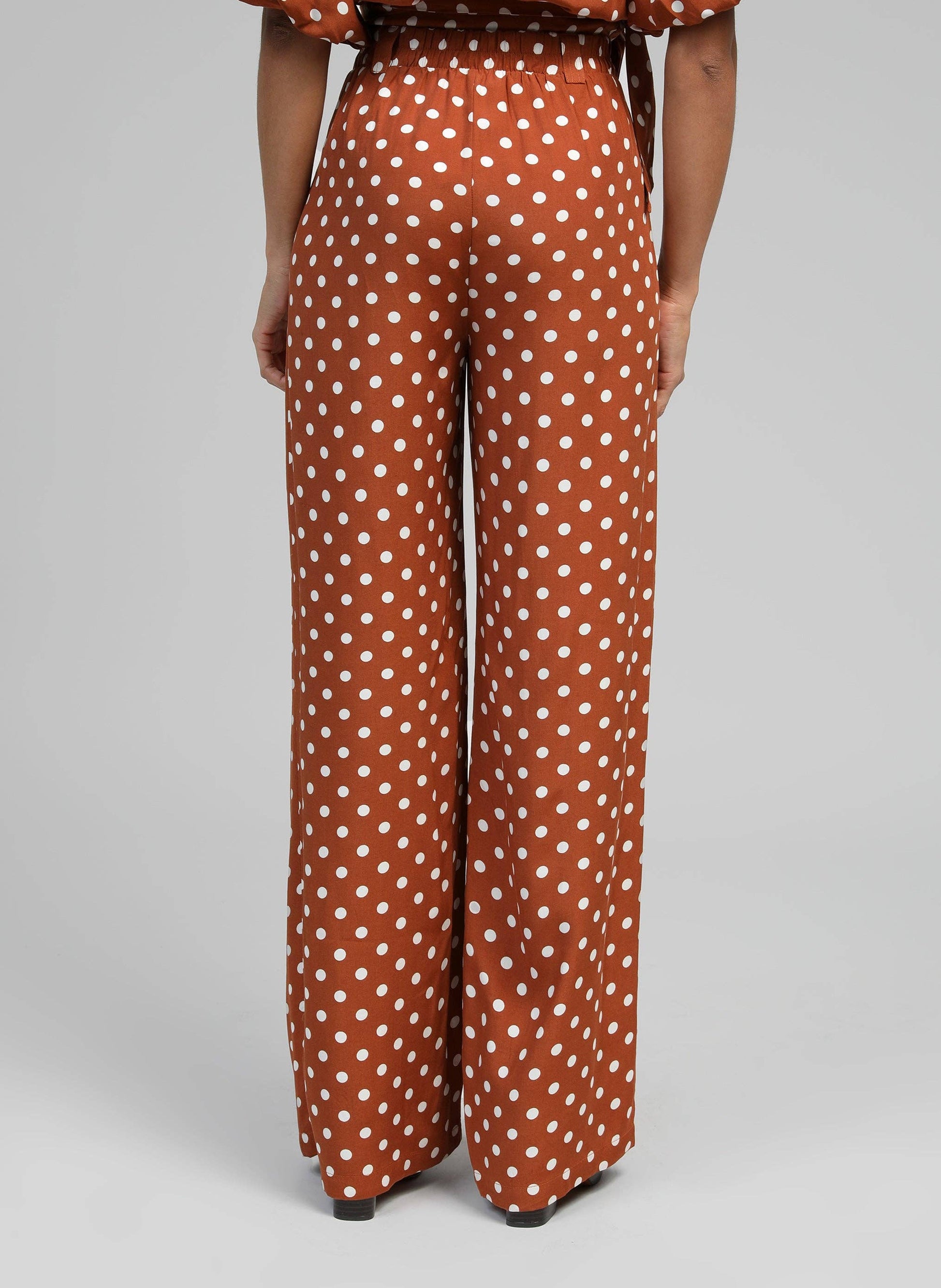 Pantaloni flare a pois caramello a vita alta