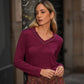 Maglia donna a manica lunga con scollo a V e borchie