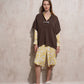 Cappa in maglia con fibbia decorativa