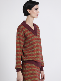 Set maglia in maglia con scollo a V e gonna midi coordinata