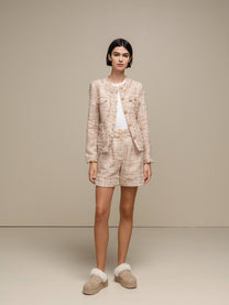Blazer bouclé corto con bottoni gioiello