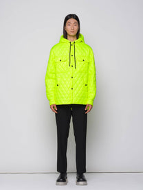 Giacca trapuntata a rombi con cappuccio fluo