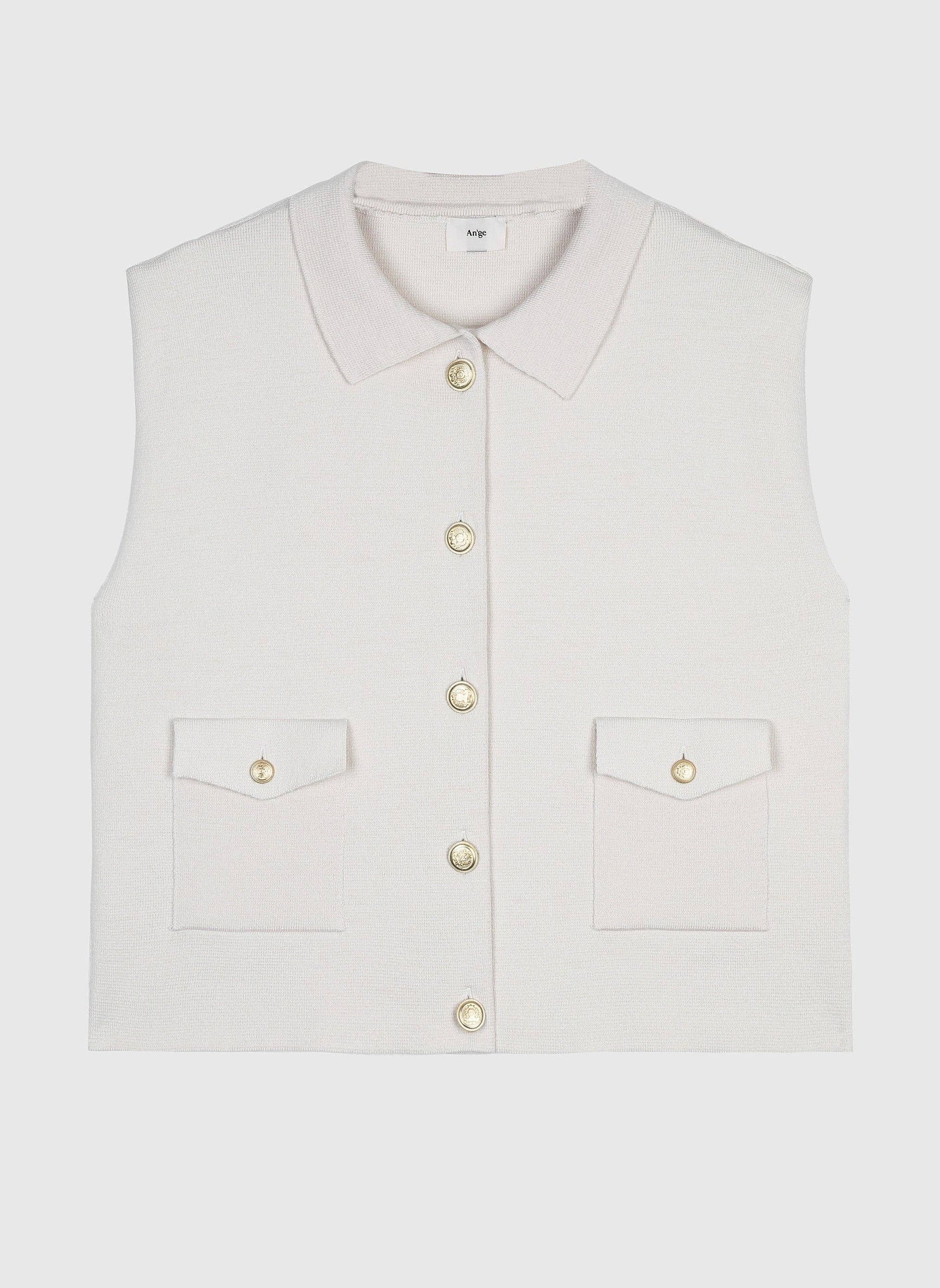 Cardigan smanicato bianco in maglia con bottoni