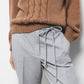 Pantaloni dritti con laccio in vita