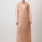 Abito pinafore in tweed a quadri con scollo a V