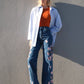 Jeans in denim a vita alta con ricamo floreale