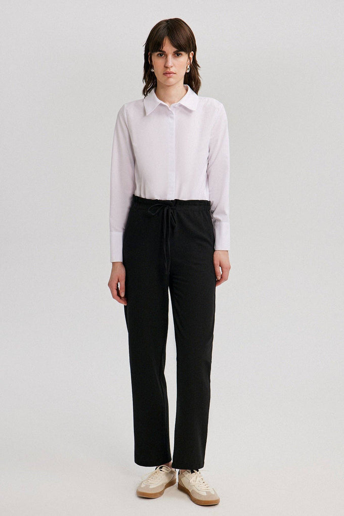 Pantaloni effetto naturale con elastico in vita
