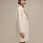 Cappotto bicolore effetto bouclé cammello e panna