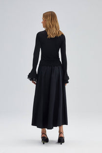 Blusa in maglia con maniche a balze in chiffon