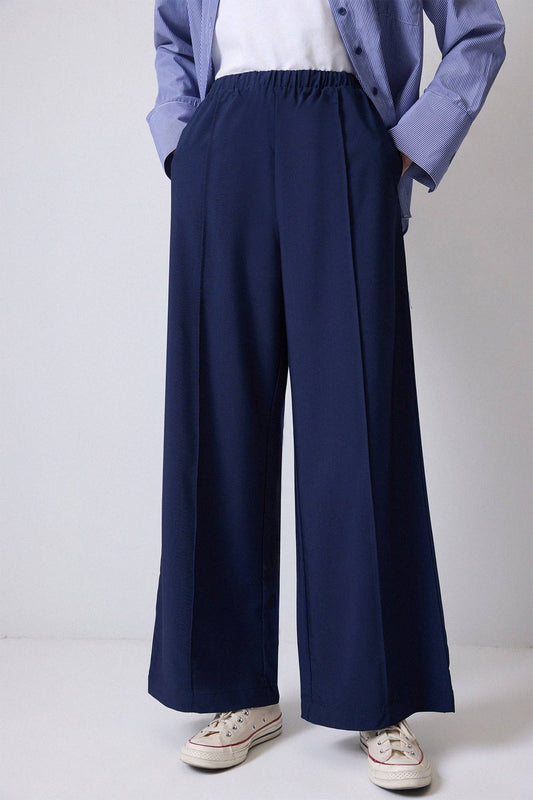 Pantaloni palazzo a coste con vita elastica