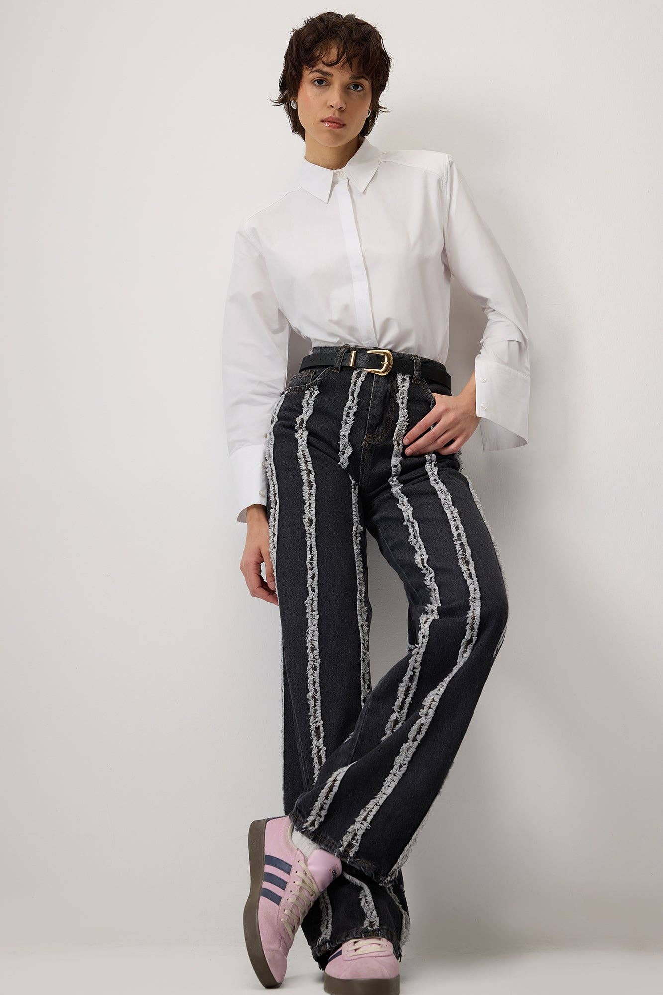 Pantaloni in denim con frange