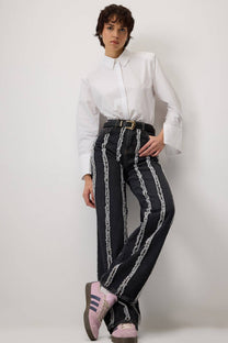 Pantaloni in denim con frange