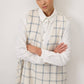 Abito gilet lungo in tweed a quadri con scollo a V