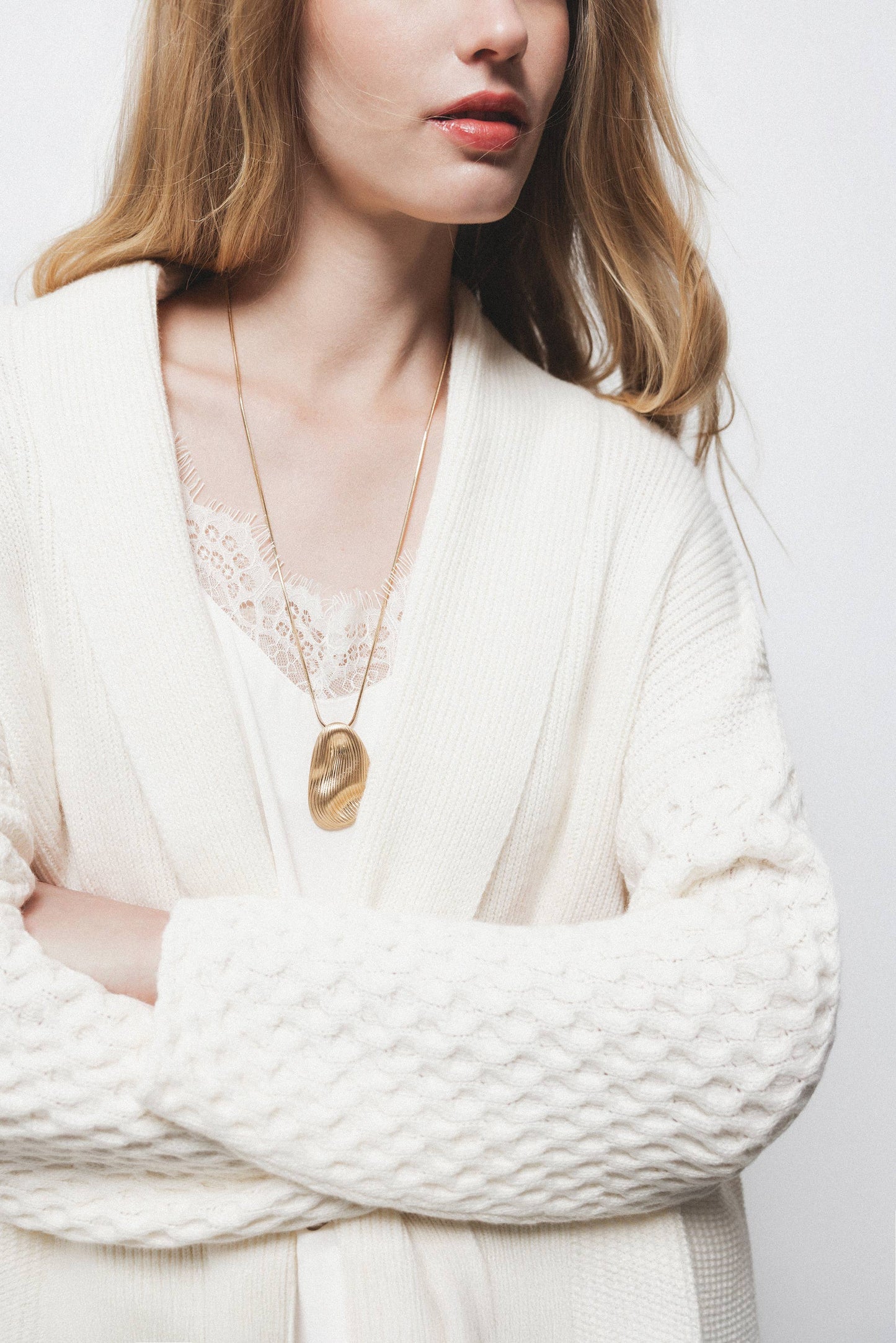 Cardigan a maglia strutturata con collo a imbuto