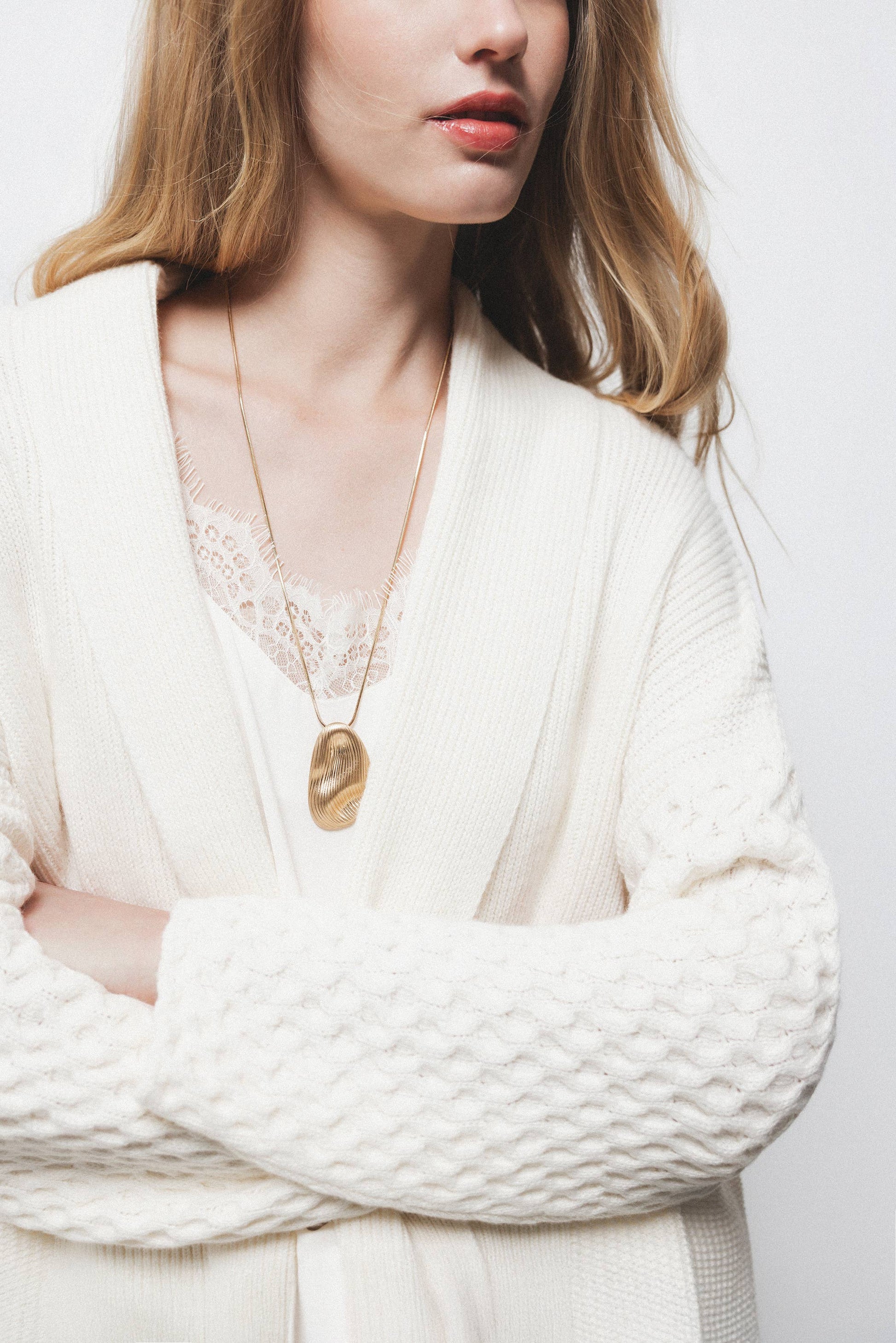 Cardigan a maglia strutturata con collo a imbuto