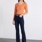 Maglia a costine arancione con scollo a V