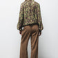 Pantaloni dritti eleganti con tasche oblique