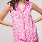 Blusa in raso stampato senza maniche con scollo a V