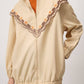 Giacca impermeabile ricamata beige