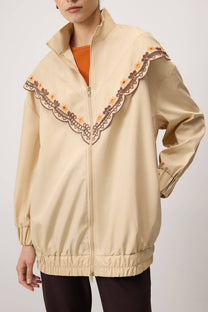 Giacca impermeabile ricamata beige