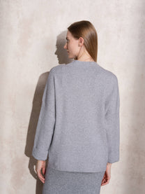 Maglione in maglia con motivo a pois e bottoni ai polsi