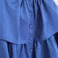 Blusa corta indaco con balze e maniche a sbuffo in cotone misto