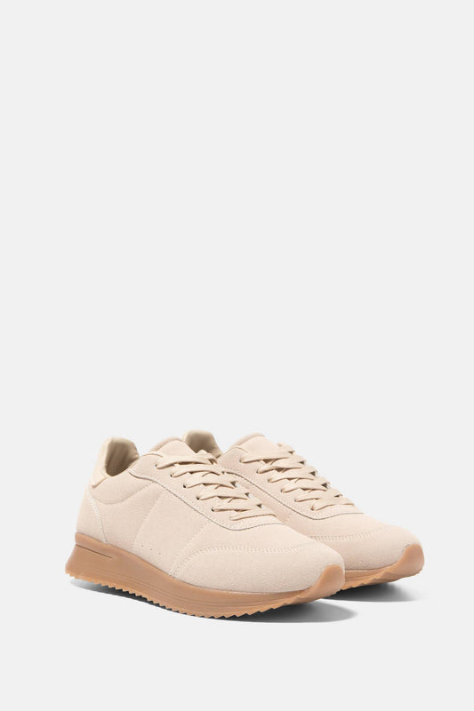 Sneakers bicolori con suola platform