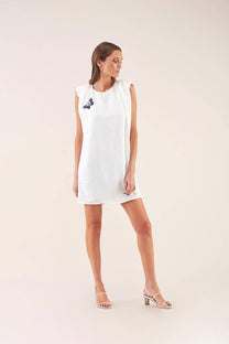 Abito mini bianco con patch farfalla