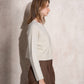 Maglia girocollo cropped in maglia morbida
