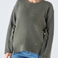 Maglione in maglia con fibbia laterale