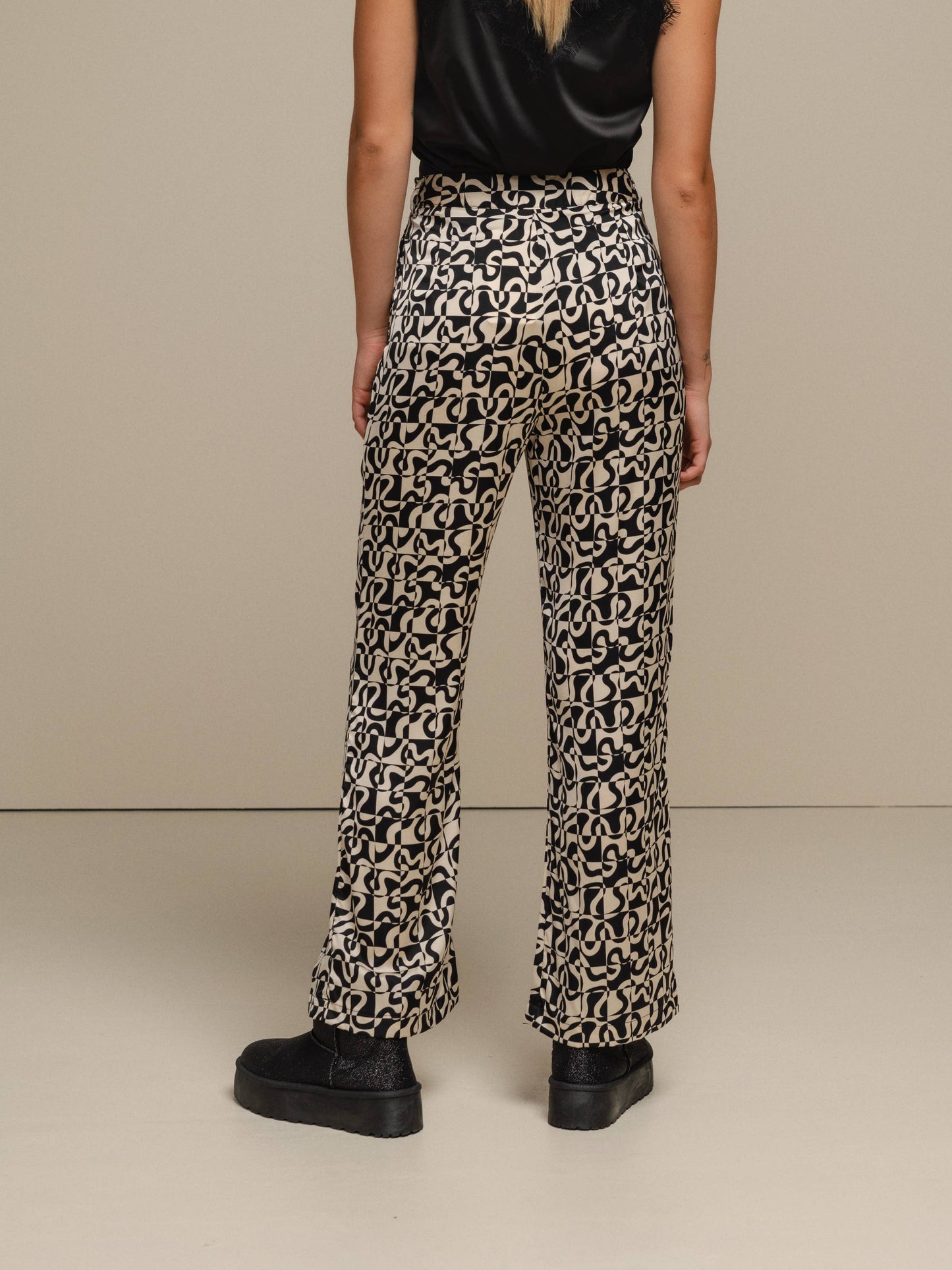 Pantaloni a fantasia geometriche effetto perlato