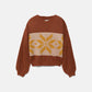 Maglione in maglia jacquard con maniche a palloncino