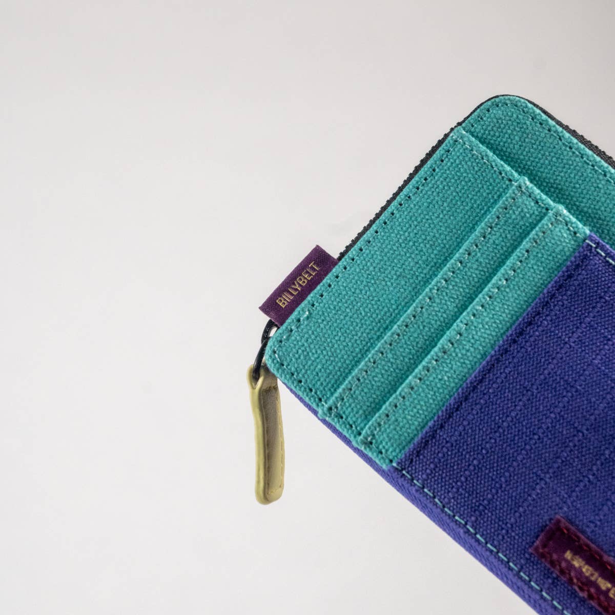 Portafoglio multicolore compatto con zip