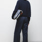 Pantaloni dritti essenziali con tasche oblique