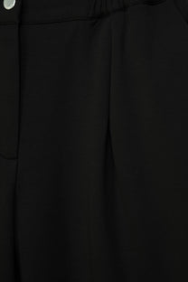 Pantaloni palazzo neri con piega frontale
