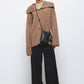 Cardigan a coste con collo ampio