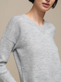 Maglione in maglia con scollo a V e micro paillettes