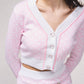 Cardigan corto in maglia jacquard con bottoni
