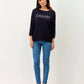 Maglia blu navy con scritta Dream e applicazioni